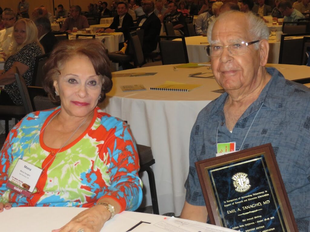 Dr. Tanagho seated with his wife, Mona, at the 2015 meeting at Indian Wells, CA after receiving a plaque for his outstanding contributions to the Western Section and 51 year meeting attendance record!